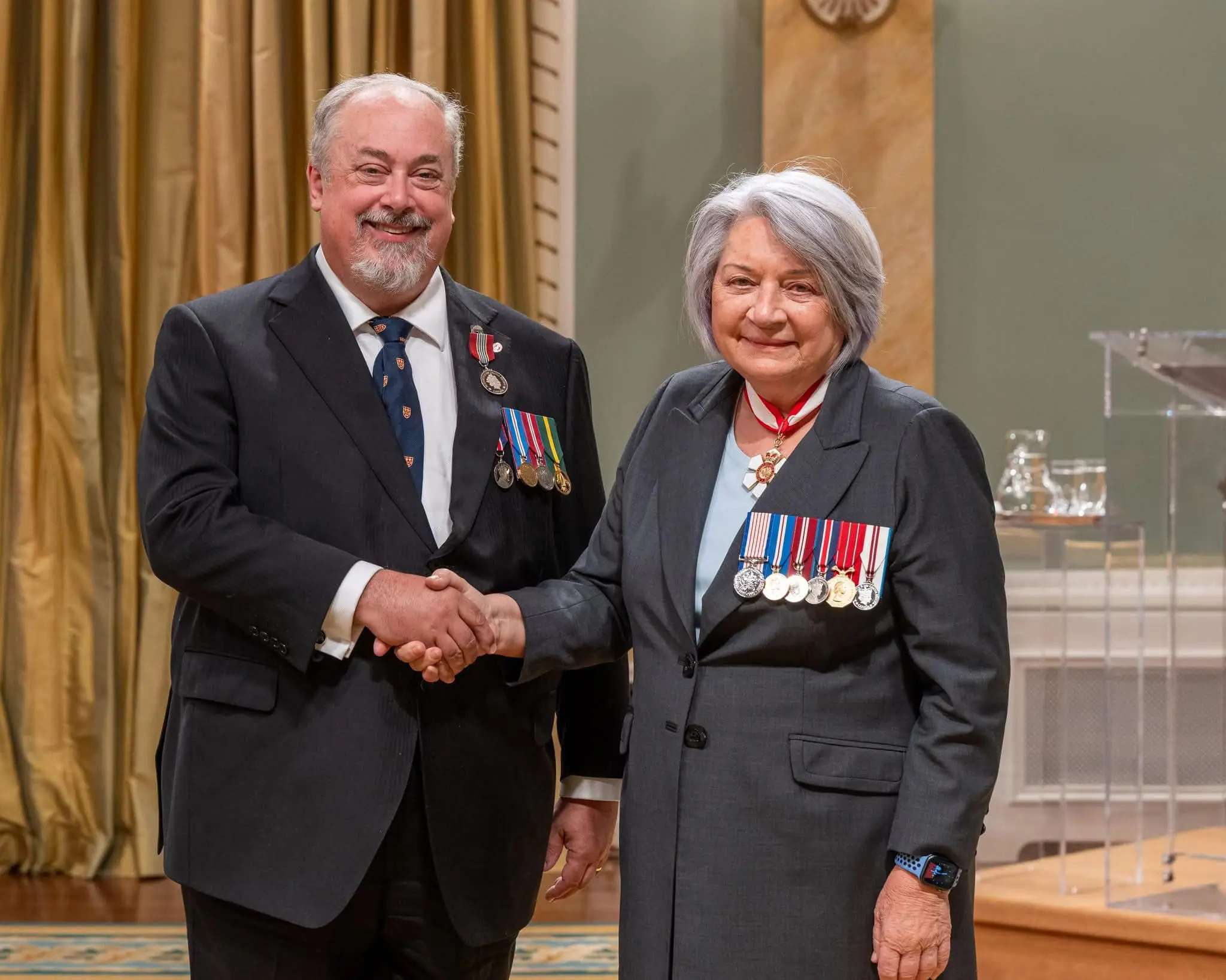 Victoria Lawyer Bruce Hallsor presented with the King’s medal for volunteers from the Governor General
